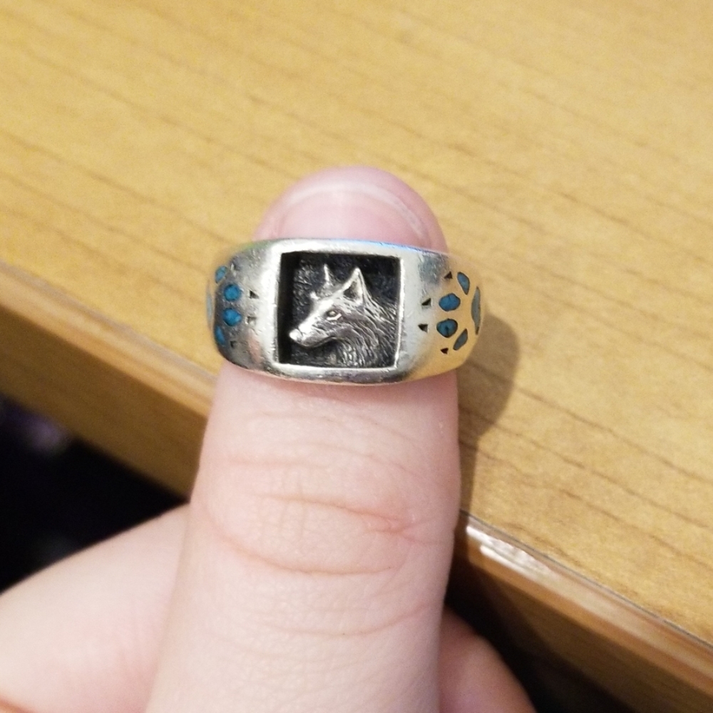 Sterling silver and turquoise stones.